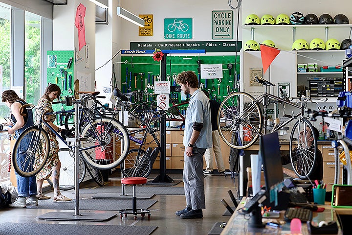Students maintain their bicycles in the Bike Program DIY workspace